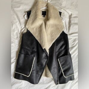Faux leather and fur vest